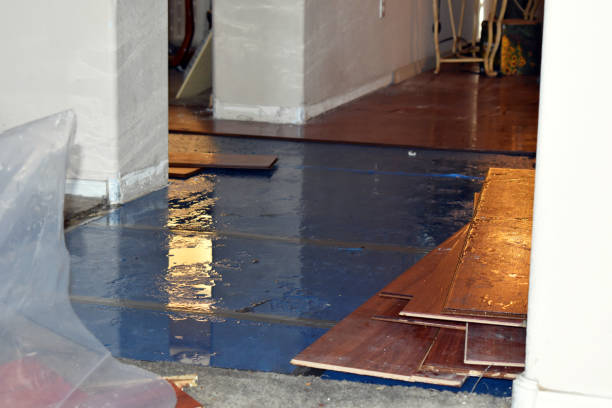 Professional Storm Water Damage Restoration technician working in Barrington, NH
